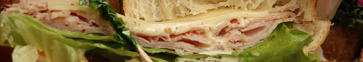 Eating Deli Sandwich at Jersey Joe's Hoagies restaurant in West Berlin, NJ.